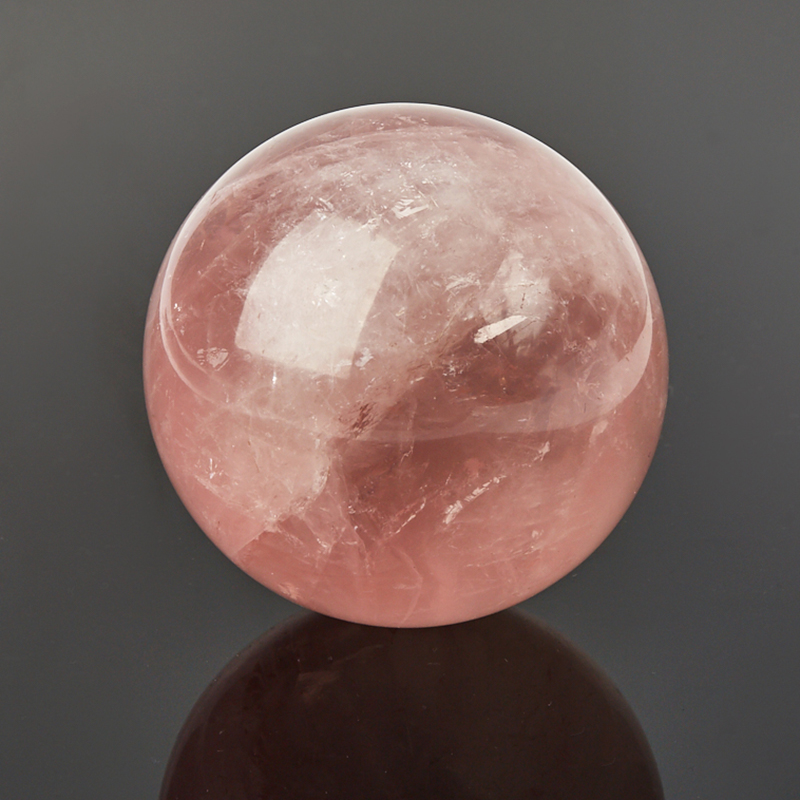 Розовый лунный камень. Звездчатый розовый кварц. Розовый кварц с астеризмом. Полупрозрачный звёздчатый розовый кварц. Шар из розового кварца.
