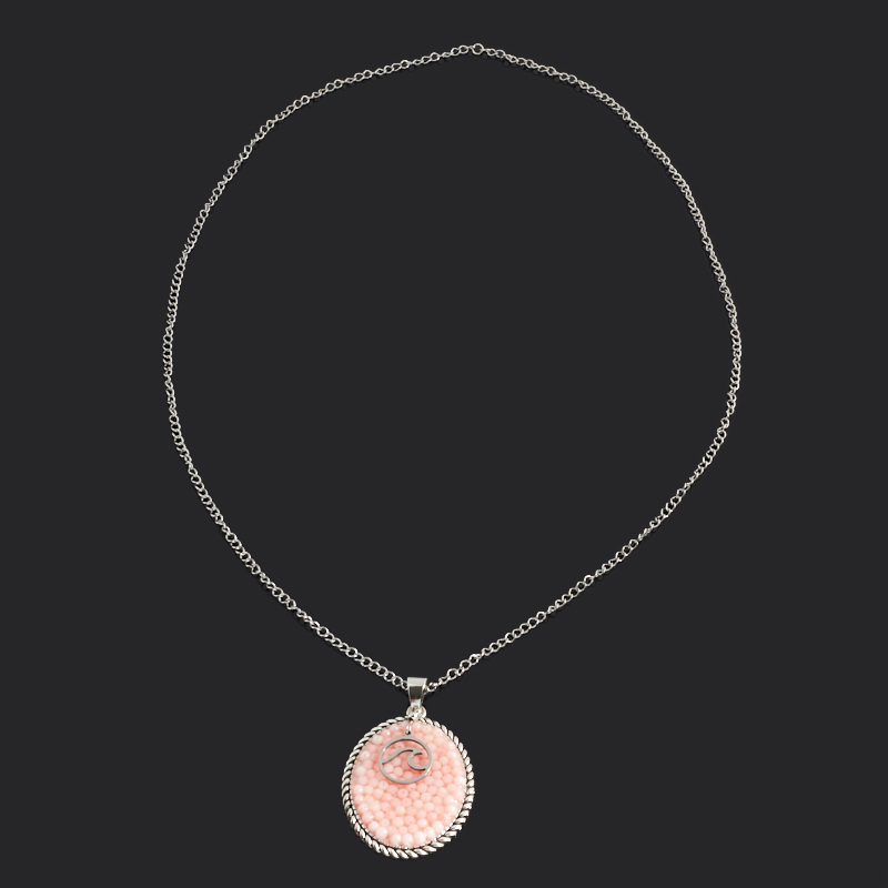 Кулон коралл розовый Индонезия (биж. сплав, сталь хир.) овал 5,5 см