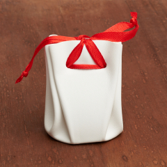 Подарочная упаковка (кожа иск.) универсальная (мешочек объемный) (микс) 60х50х45 мм