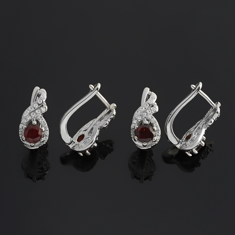 Серьги гранат альмандин Индия (сталь хир.) огранка