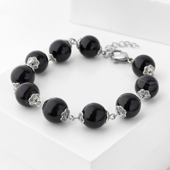 Браслет агат черный Бразилия 12 мм 17 см (+3 см) (сталь хир.)