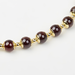 Чокер гранат альмандин Индия (биж. сплав позолота) 6 мм 40 см (+5 см)