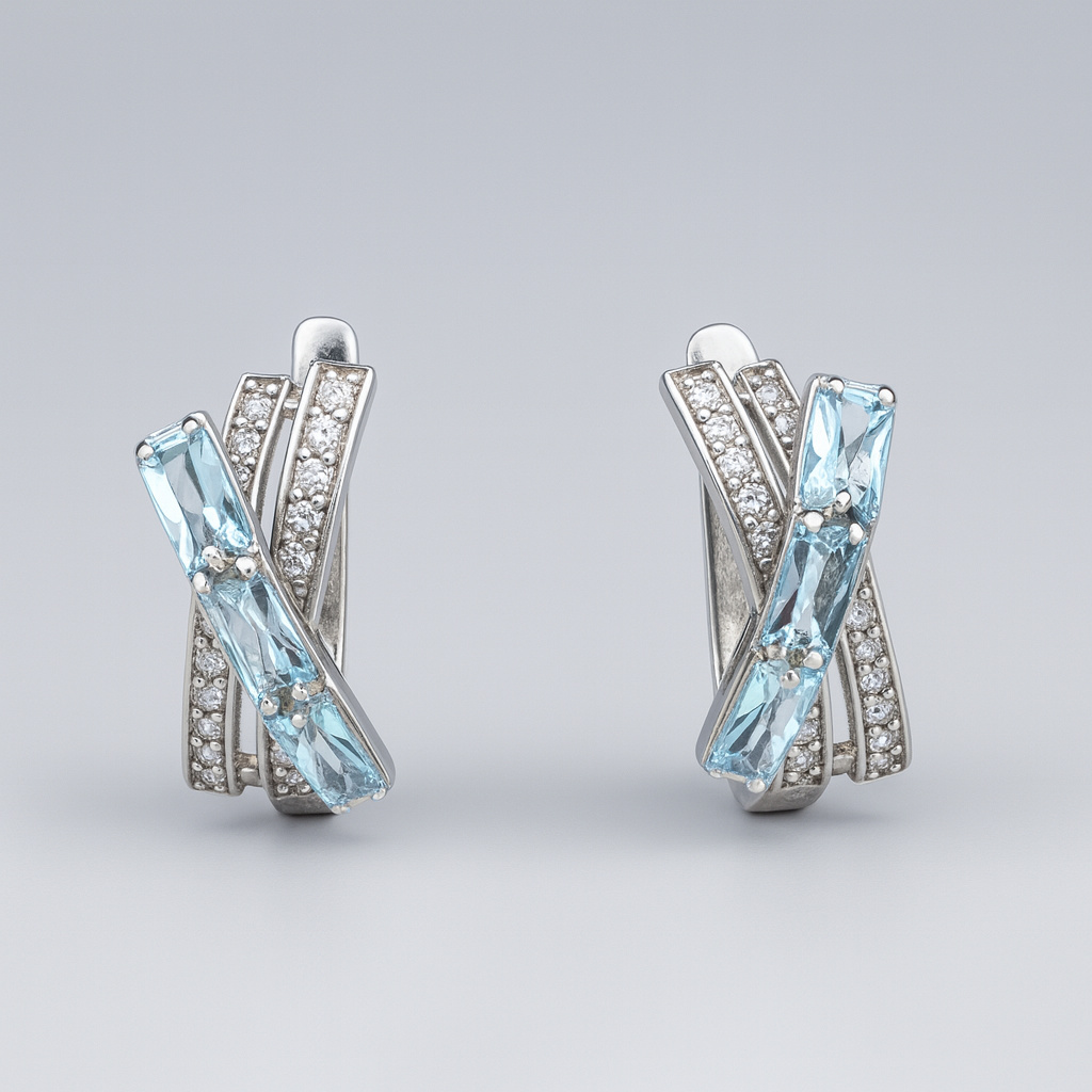 Серьги топаз голубой Бразилия (серебро 925 пр. родир. бел.) пуссеты огранка