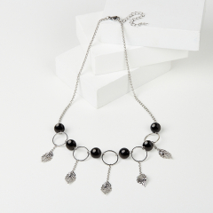 Бусы турмалин черный (шерл) Бразилия (сталь хир.) (колье) 10 мм 46 см (+7 см)