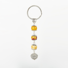 Брелок яшма мукаит Австралия (биж. сплав, сталь хир.) 7 см