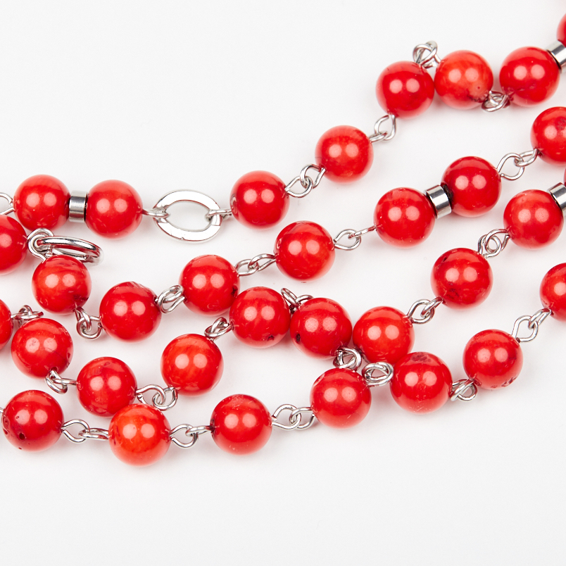Бусы коралл красный Индонезия (сталь хир.) длинные 7 мм 105 см